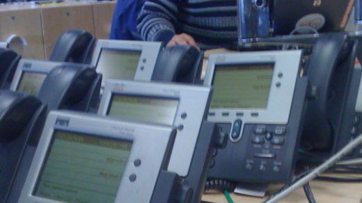many office phones ready to be answered