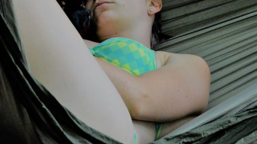 girl sleeping on hammock