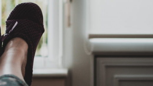 feet wearing slippers